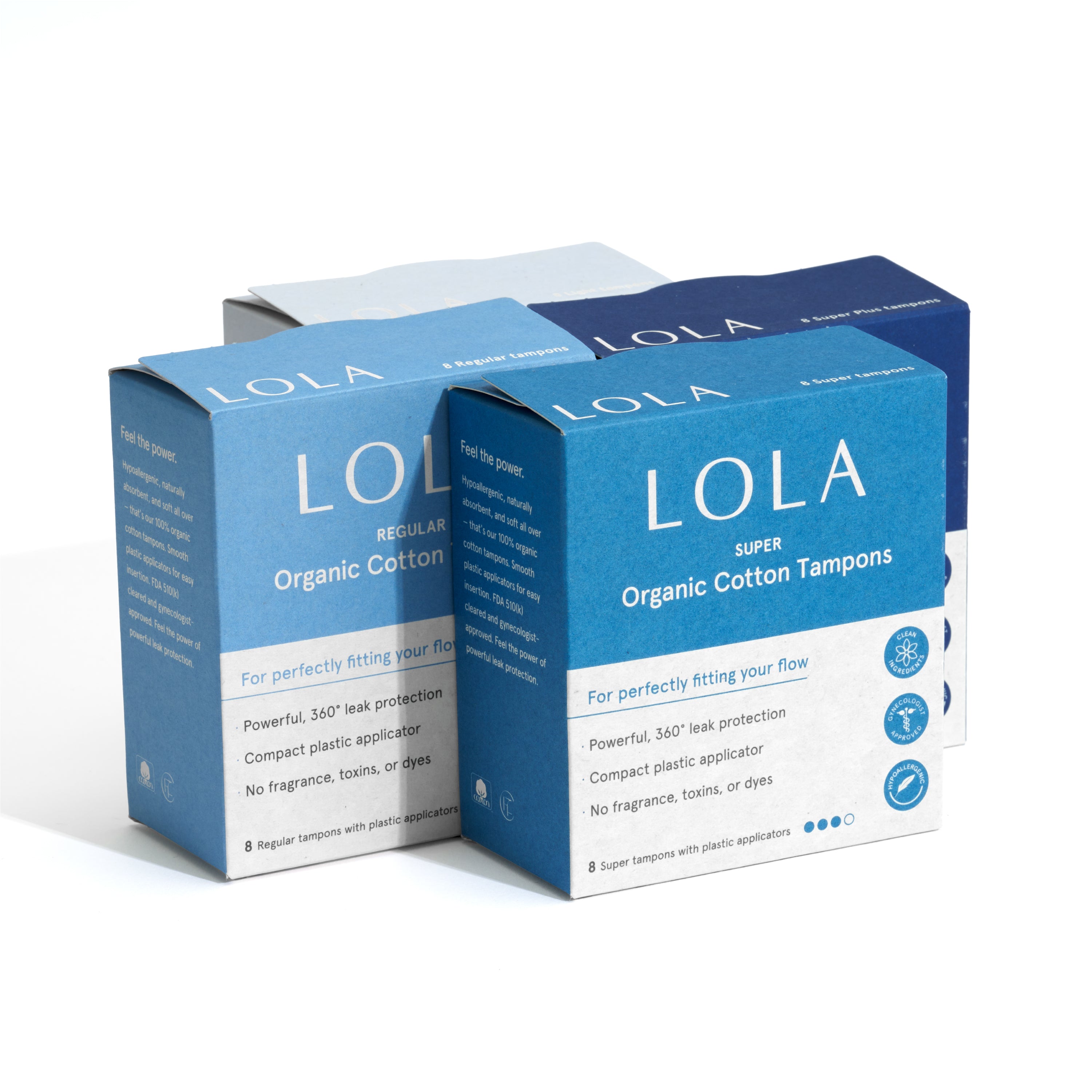 Four boxes of LOLA organic cotton tampons on a white background