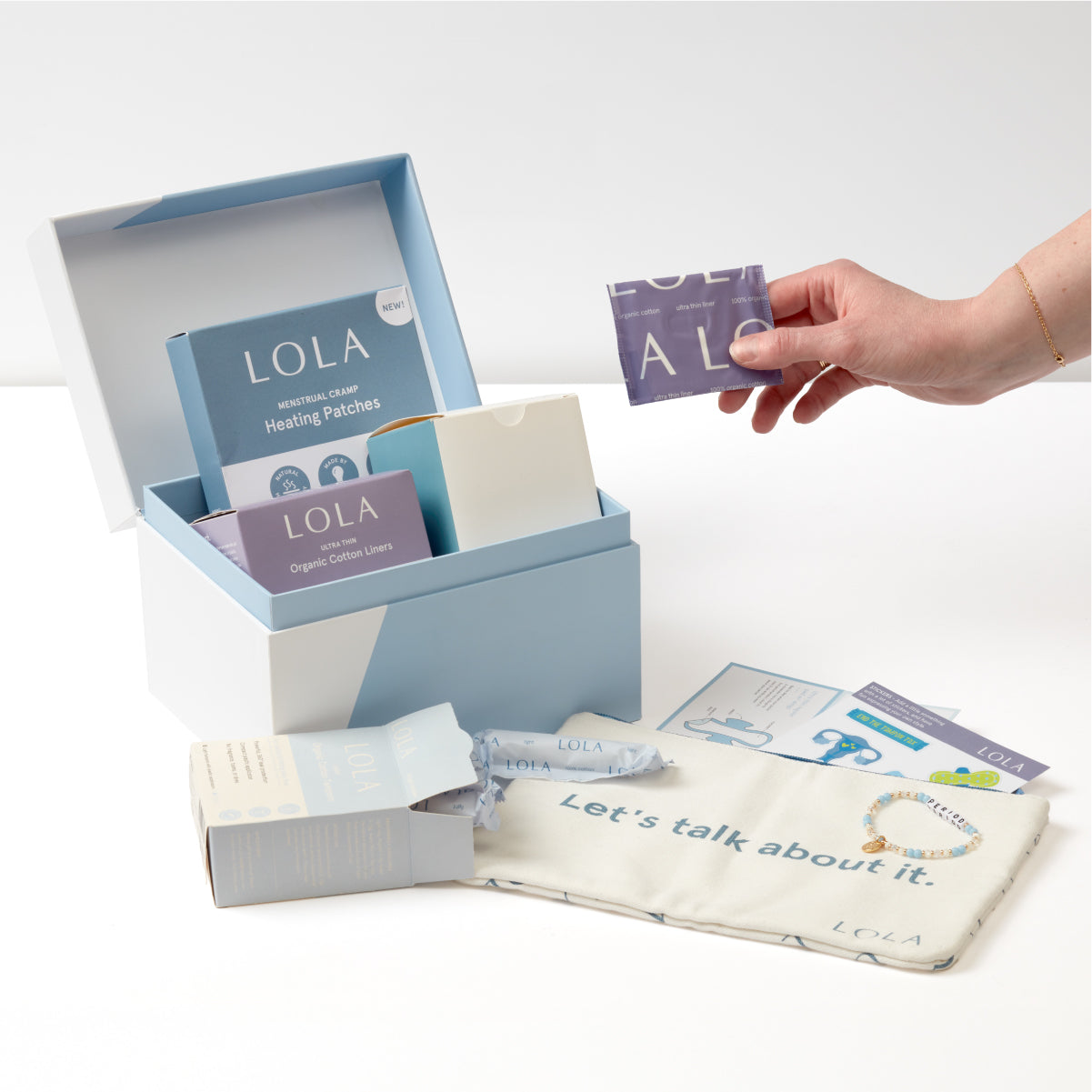 LOLA product set including boxes and packets on a white background